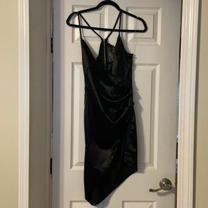 Never worn silk black dress. Spaghetti straps to a low v-neck with a lace back